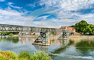 Eiserner Steg bridge across the Danube River in Regensburg, Germany