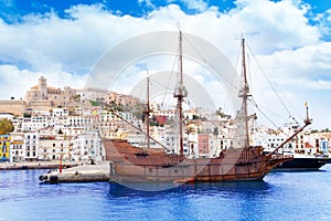 Eivissa ibiza town with old classic wooden boat photo