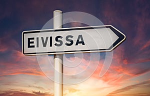 Eivissa signpost during cloudy sky sunset background. Ibiza, Spain photo