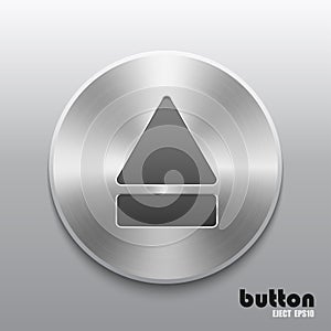 Eject button with brushed metal texture on gray background