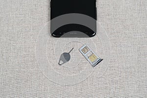 Eject tool and Sim card tray on 2 sims
