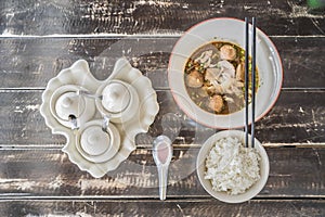 Ekaehla and rice set on the shiny wooden table