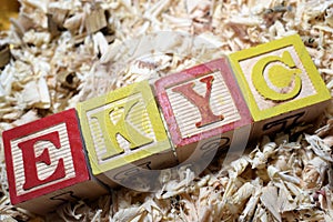 EKYC electronic-know your customer acronym on wooden blocks photo