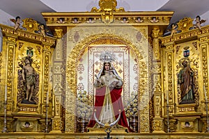 El Almendro, Huelva, Spain - March 13, 2021: Altar of virgin Nuestra SeÃÂ±ora de Piedras Albas, inside the hermitage with the same photo
