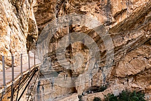 El Caminito del Rey walkway along the steep walls of a narrow gorge in El Chorro, Spain