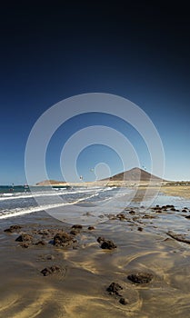 El medano beach and montana roja landscape in tenerife spain photo