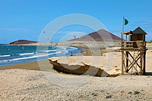 El Medano in Tenerife with Montana Roja Red Mountain and beach on the background