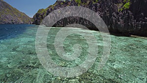 El Nido, Palawan Island, Philippines. Ocean rippled surface near Matinloc island. Bacuit Archipelago