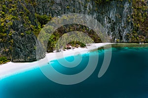 El Nido, Palawan, Philippines. Aerial drone view of solitude tropical hut on Pinagbuyutan Island. Amazing white sand