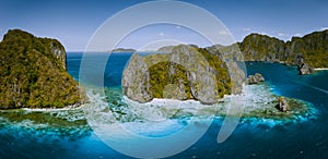 El Nido, Palawan, Philippines. Aerial view of bacuit archipelago exotic island surrounded by blue ocean with tourist