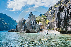 El Nido Palawan Philippines Asia. Banca boat at a small beach near the Matinloc Shrine. Trip highlights of Tour C