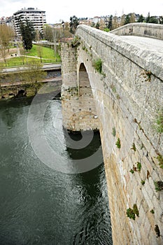 Puente medieval Puente romano sobre el rio MiÃÂ±o en Ourense Orense, Galicia, EspaÃÂ±a photo