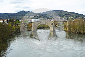 Puente medieval Puente romano sobre el rio MiÃÂ±o en Ourense Orense, Galicia, EspaÃÂ±a photo