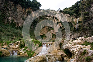 El Salto waterfall with no water dropping and full of natural turquoise water pools