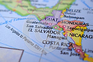 EL Salvador GUAT Travel Concept Country Name On The Political World Map Very Macro Close-Up View Stock Photograph photo