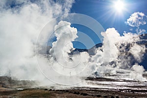 El Tatio geysers in Chile, Silhouette of a man walking among the steams and fumaroles