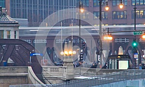 El train speeds over the Chicago Loop on a foggy morning in January. photo