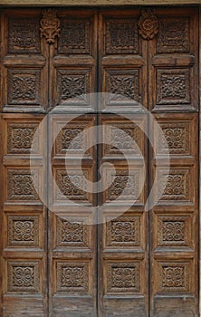 Elaborate carved wooden doors of Cathedral of St Catherine