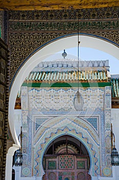 Elaborate and colorful mosque with many ornaments and carvings in Fes, Morocco, North Africa