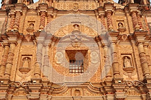 Elaborate facade of the church Templo de Santo Domingo de Guzman in San Cristobal de las Casas, Chiapas, Mexico photo