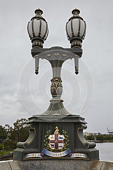 Elaborate victorian era lamp posts on top of the balustrades of Princes Bridge in Melbourne, Australia