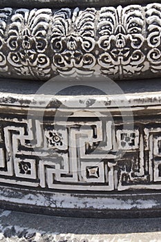 Elaborately decorated bases of the massive columns
