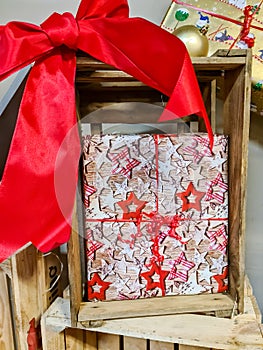 Elaborately wrapped gifts with a bow to decorate a shop window