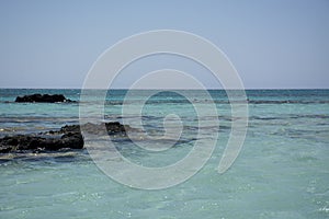 Elafonisi beach, Crete Island landmark. Paradise beach with turquoise water and pink sand, Greece