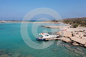 Elafonisi lagoon, Crete island Greece. Aerial drone view of turquoise water, beach with pink sand