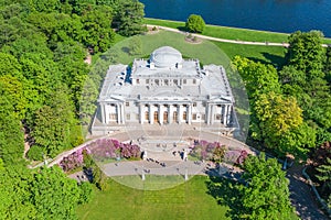 Elagin Palace blooming lilac in the park on the Elagin Island in St. Petersburg, aerial view