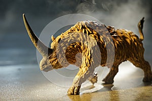 Elasmotherium on a misty forest. closeup dinosaur and monster model