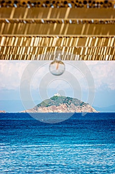 Elba island, chiringuito of Cavo, palmaiola island photo