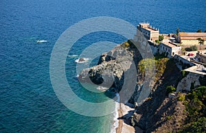 Elba island, Italy. Old town of Portoferraio, cliffs and beach