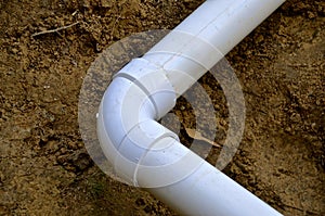 Elbow changing direction of PVC pipe