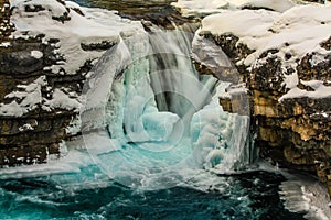 Elbow falls in winter coverings photo