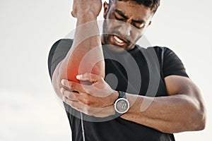 Elbow injury, fitness and man with pain while training, sports emergency and accident during workout. Cramp