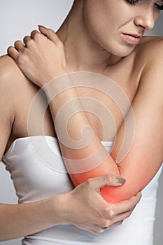 Elbow Pain. Closeup Beautiful Female Body With Pain In Arms