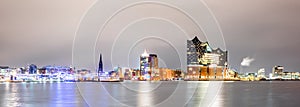 Elbphilharmonie and Hamburg harbor at night photo