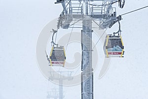 Elbrus, Russian Federation - January 20, 2024: Ski lifts on Elbrus during heavy snowfall