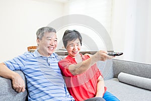 Eldely couple watch tv