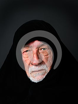 Elder Arab Sheik with a somber expression photo