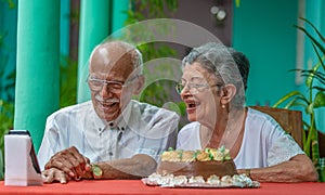 Elder couple celebrating man`s 92