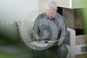 Elder man in bankrupt photo