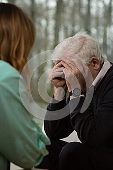 Elder man crying