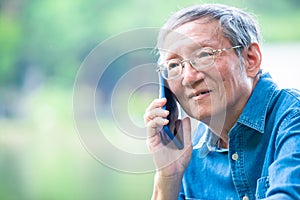 Elder man talk on phone