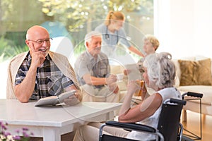 Elder talking to woman