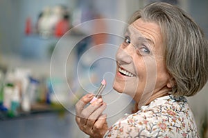 Elder woman with lipstick