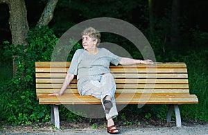 Elder woman on park bench