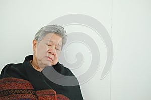 elder woman taking a nap. asian elderly senior napping sleeping