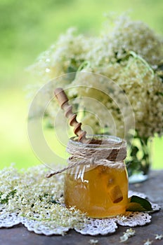 Elderflower honey in jar photo